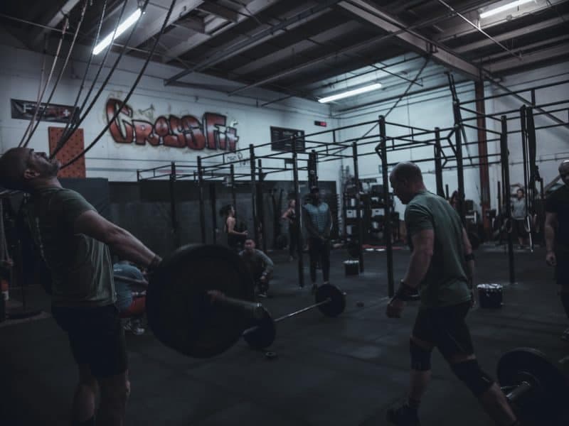 Athlete performing a barbell clean at CrossFit San Ramon